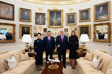 President Trump and First Lady Melania Trump with President Xi Jinping and Madame Peng Liyuan in the Oval Office during the state visit
